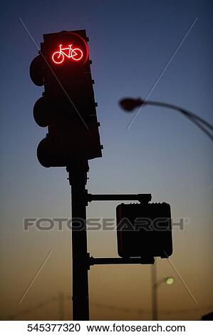 Silhouette of a traffic light at dusk, New York City, New York State, USA View Large Photo Image Stock Image - Silhouette of a traffic light at dusk, New York City, New York State, USA. Fotosearch