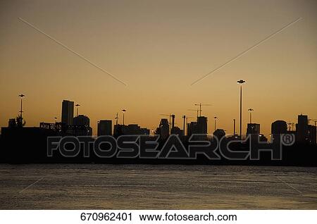 Silhouette of buildings at the waterfront, Miami, Miami-Dade County, Florida, USA View Large Photo Image Stock Image - Silhouette of buildings at the waterfront, Miami, Miami-Dade County, Florida, USA. Fotosearch