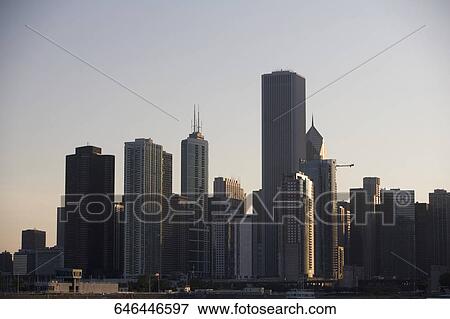 Skyscrapers in a city, Chicago, Illinois, USA View Large Photo Image Stock Photo - Skyscrapers in a city, Chicago, Illinois, USA. Fotosearch