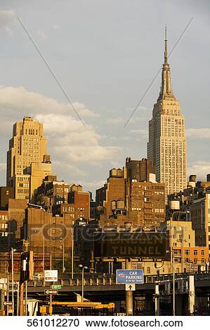 Skyscrapers in a city, Empire State Building, Manhattan, New York City, New York State, USA View Large Photo Image Stock Image - Skyscrapers in a city, Empire State Building, Manhattan, New York City, New York State, USA. Fotosearch