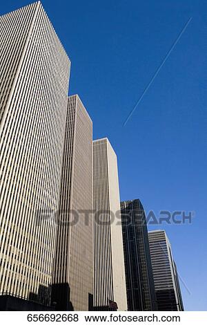 Skyscrapers in a city, Sixth Avenue, New York City, New York State, USA View Large Photo Image Stock Photo - Skyscrapers in a city, Sixth Avenue, New York City, New York State, USA. Fotosearch