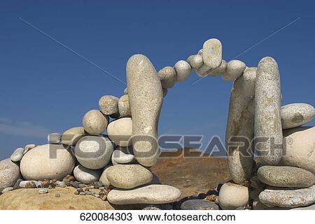 Stones arranged in an arch shape View Large Photo Image Stock Image - Stones arranged in an arch shape. Fotosearch