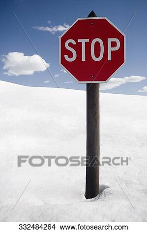 Stop signboard in snow View Large Photo Image Picture - Stop signboard in snow. Fotosearch