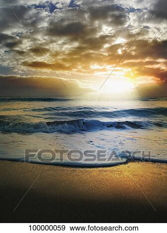 Sun shining through clouds View Large Photo Image Stock Photo - Sun shining through clouds. Fotosearch