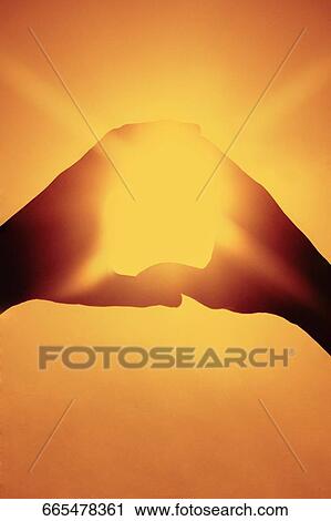 Sunlight shining through a finger frame View Large Photo Image Stock Image - Sunlight shining through a finger frame. Fotosearch