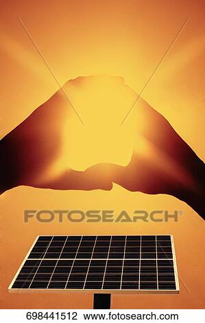 Stock Image - Sunlight shining through a finger frame. Fotosearch