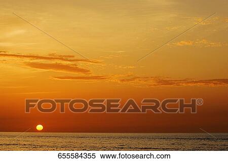 Sunset over the sea, Florida Keys, Florida, USA View Large Photo Image Stock Photography - Sunset over the sea, Florida Keys, Florida, USA. Fotosearch