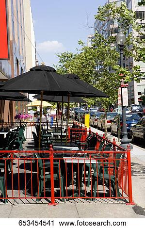Tables and chairs at a sidewalk cafe in a city, Washington DC, USA View Large Photo Image Stock Image - Tables and chairs at a sidewalk cafe in a city, Washington DC, USA. Fotosearch