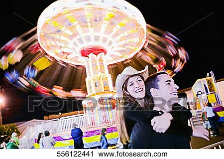 Teenage girl riding piggyback a teenage boy View Large Photo Image Stock Image - Teenage girl riding piggyback a teenage boy. Fotosearch