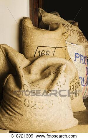 Three sacks of coffee beans in a storage room View Large Photo Image Stock Photo - Three sacks of coffee beans in a storage room. Fotosearch
