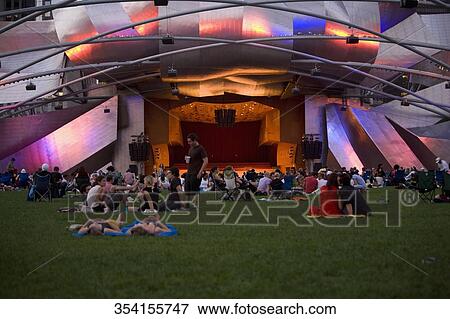 Tourists sitting outside an auditorium, Jay Pritzker Pavillion, Millennium Park, Chicago, Illinois, USA View Large Photo Image Stock Photo - Tourists sitting outside an auditorium, Jay Pritzker Pavillion, Millennium Park, Chicago, Illinois, USA. Fotosearch