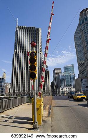 Traffic light with a barricade near the road, Chicago, Illinois, USA View Large Photo Image Stock Photo - Traffic light with a barricade near the road, Chicago, Illinois, USA. Fotosearch