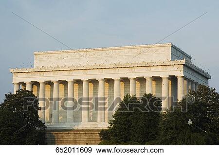 Stock Photo - Trees in front a hotel building, L'Enfant Plaza Hotel, Washington DC, USA. Fotosearch