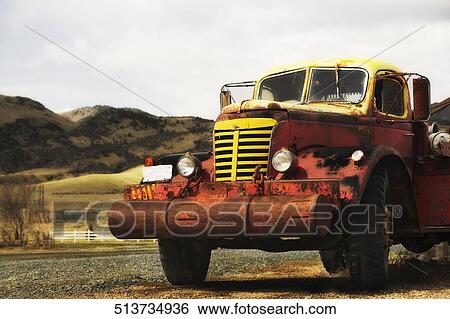 Truck on a field, Montana, USA View Large Photo Image Stock Photograph - Truck on a field, Montana, USA. Fotosearch
