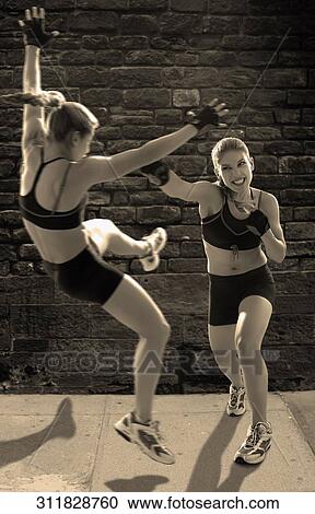Two young women boxing View Large Photo Image Stock Image - Two young women boxing. Fotosearch