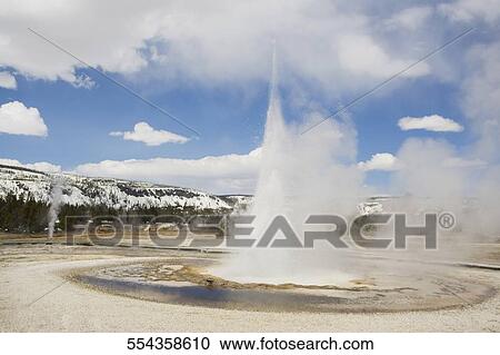Water erupting from a natural geyser, Old Faithful, Yellowstone National Park, Wyoming, USA View Large Photo Image Stock Image - Water erupting from a natural geyser, Old Faithful, Yellowstone National Park, Wyoming, USA. Fotosearch