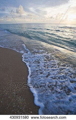 Waves on the beach View Large Photo Image Stock Image - Waves on the beach. Fotosearch