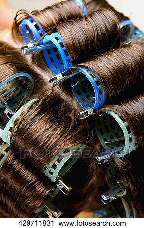 Woman wearing hair rollers View Large Photo Image Stock Image - Woman wearing hair rollers. Fotosearch