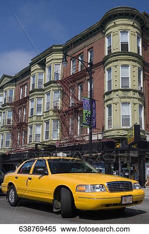 Stock Photography - Yellow taxi on the road, Boystown, Northalsted, Chicago, Illinois, USA. Fotosearch
