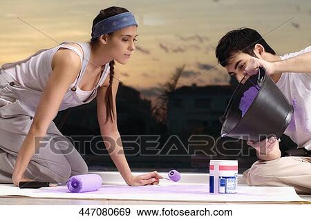 Young couple mixing colors View Large Photo Image Stock Photo - Young couple mixing colors. Fotosearch