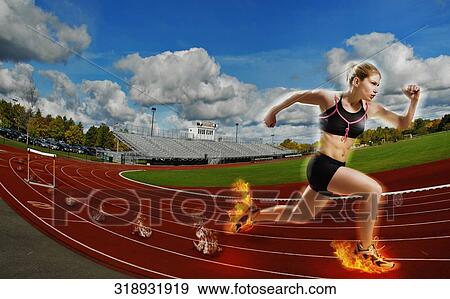 Young woman running on a running track View Large Photo Image Stock Photo - Young woman running on a running track. Fotosearch