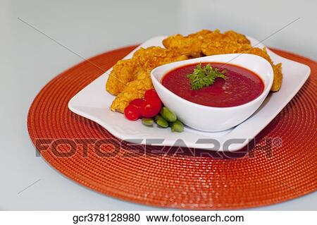 Batter fried chicken with ketchup View Large Photo Image Stock Image - Batter fried chicken with ketchup. Fotosearch