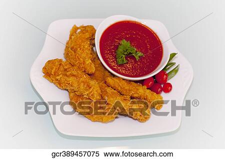 Batter fried chicken with ketchup View Large Photo Image Stock Photography - Batter fried chicken with ketchup. Fotosearch