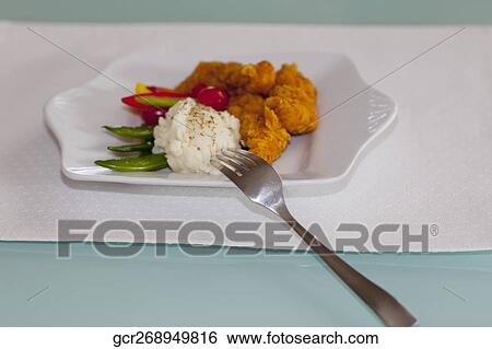 Batter fried chicken with mashed potatoes View Large Photo Image Stock Photograph - Batter fried chicken with mashed potatoes. Fotosearch