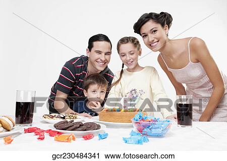 Boy and a girl with their parents View Large Photo Image Stock Image - Boy and a girl with their parents. Fotosearch