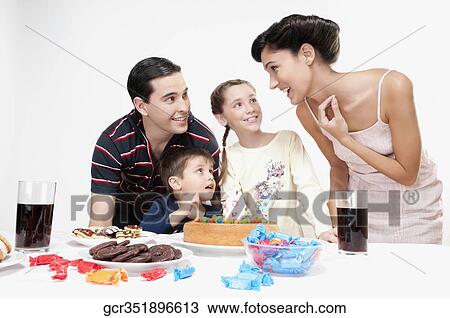 Boy and a girl with their parents View Large Photo Image Stock Image - Boy and a girl with their parents. Fotosearch
