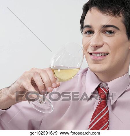 Businessman drinking wine View Large Photo Image Stock Photo - Businessman drinking wine. Fotosearch