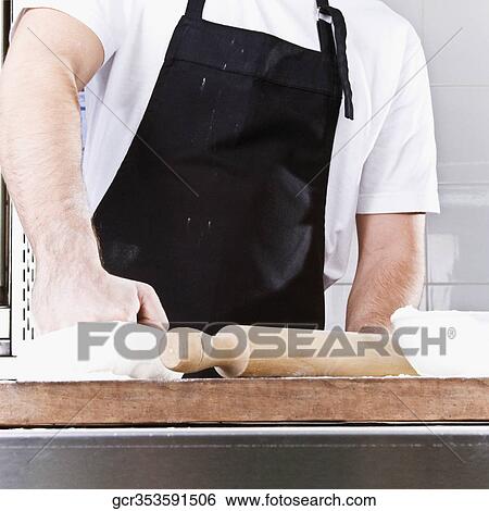Chef kneading pizza dough View Large Photo Image Stock Photograph - Chef kneading pizza dough. Fotosearch