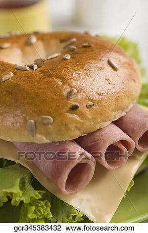 Close-up of a bacon bagel View Large Photo Image Stock Image - Close-up of a bacon bagel. Fotosearch