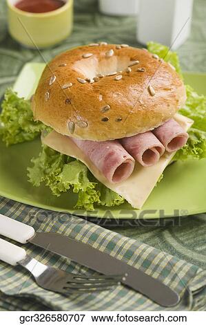 Close-up of a bacon bagel View Large Photo Image Stock Photo - Close-up of a bacon bagel. Fotosearch