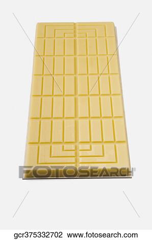 Close-up of a bar of white chocolate View Large Photo Image Stock Image - Close-up of a bar of white chocolate. Fotosearch
