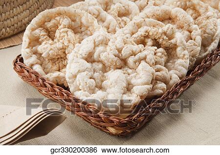 Close-up of a basket full of sweet rice cookies View Large Photo Image Stock Photograph - Close-up of a basket full of sweet rice cookies. Fotosearch