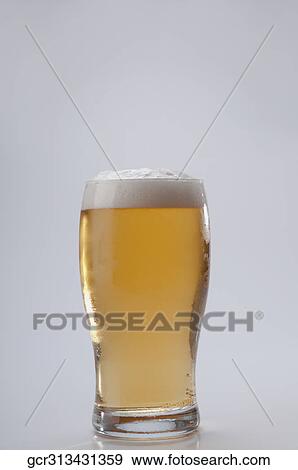Close-up of a beer glass View Large Photo Image Stock Photo - Close-up of a beer glass. Fotosearch