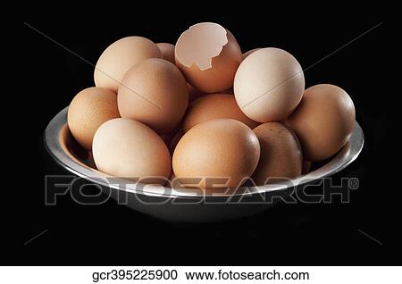Close-up of a bowl of brown eggs View Large Photo Image Stock Image - Close-up of a bowl of brown eggs. Fotosearch