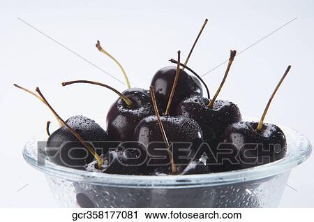 Close-up of a bowl of cherries View Large Photo Image Stock Image - Close-up of a bowl of cherries. Fotosearch