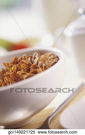 Close-up of a bowl of cornflakes View Large Photo Image Stock Photography - Close-up of a bowl of cornflakes. Fotosearch
