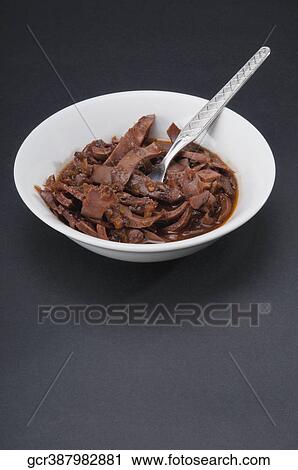 Close-up of a bowl of octopus meat View Large Photo Image Stock Image - Close-up of a bowl of octopus meat. Fotosearch