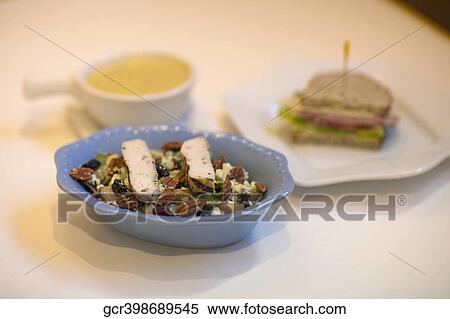 Close-up of a bowl of salad with a sandwich and soup View Large Photo Image Stock Photography - Close-up of a bowl of salad with a sandwich and soup. Fotosearch