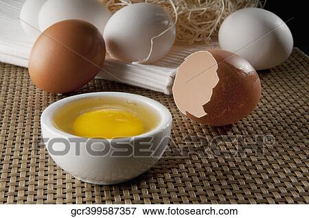 Close-up of a brown egg with white eggs View Large Photo Image Stock Photo - Close-up of a brown egg with white eggs. Fotosearch