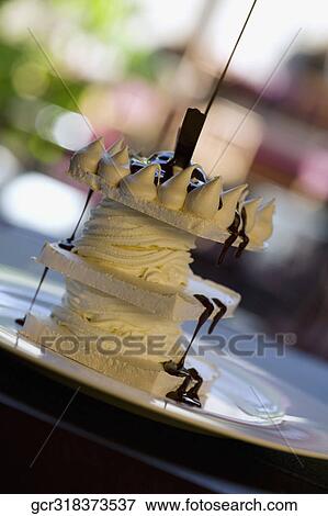 Stock Photo - Close-up of a chocolate and vanilla meringue cake. Fotosearch