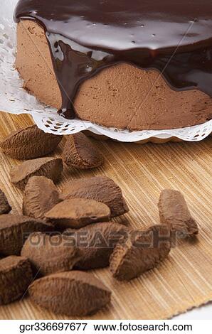 Close-up of a chocolate cake with brazil nuts View Large Photo Image Stock Photo - Close-up of a chocolate cake with brazil nuts. Fotosearch