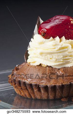Close-up of a chocolate tart View Large Photo Image Stock Image - Close-up of a chocolate tart. Fotosearch