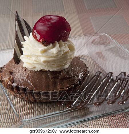 Close-up of a chocolate tart View Large Photo Image Stock Photo - Close-up of a chocolate tart. Fotosearch
