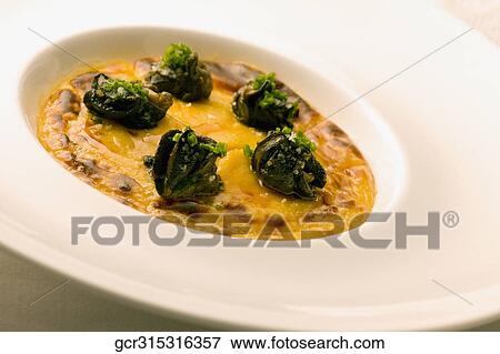 Close-up of a dish garnished with truffles View Large Photo Image Stock Photo - Close-up of a dish garnished with truffles. Fotosearch