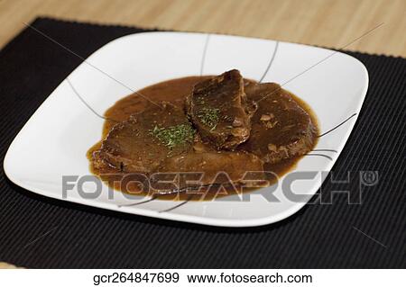 Close-up of a dish of braised lamb View Large Photo Image Stock Photo - Close-up of a dish of braised lamb. Fotosearch