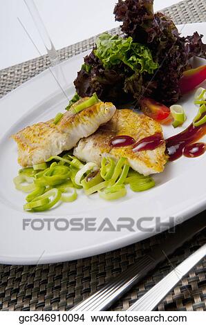 Close-up of a dish of fish fillets View Large Photo Image Picture - Close-up of a dish of fish fillets. Fotosearch